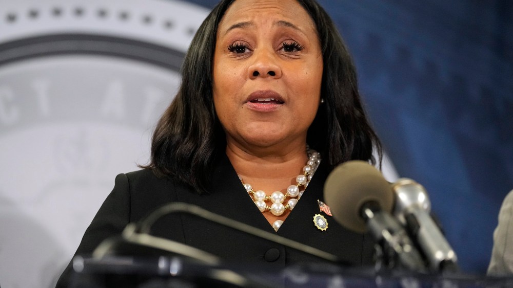 Fani Willis speaks in the Fulton County Government Center during a news conference