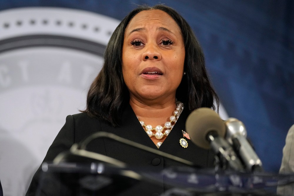 Fani Willis speaks in the Fulton County Government Center during a news conference
