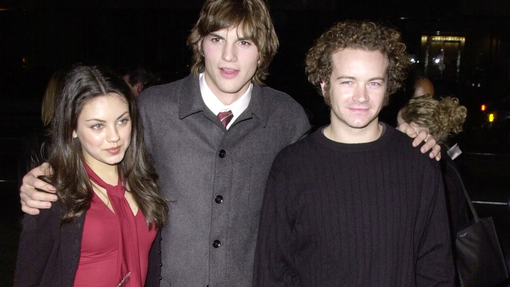 Mila Kunis, Ashton Kutcher, & Danny Masterson during "Traffic" Los Angeles Premiere at The Academy in Beverly Hills, California, United States. (Photo by SGranitz/WireImage)