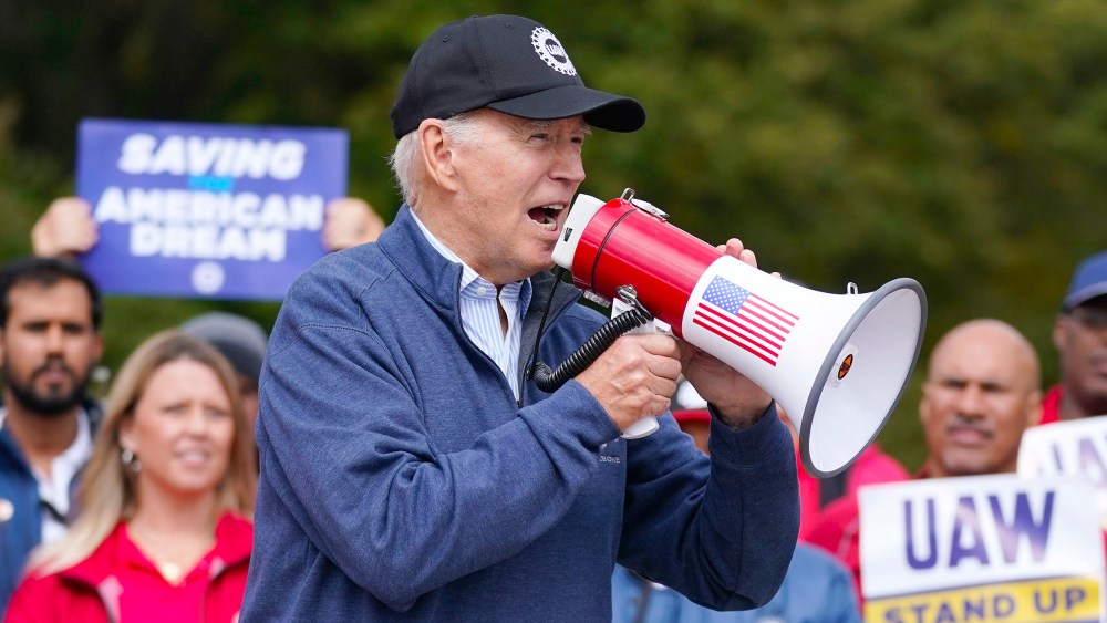 President Joe Biden joins striking United Auto Workers on the picket line, Tuesday, Sept. 26, 2023, in Van Buren Township, Mich.