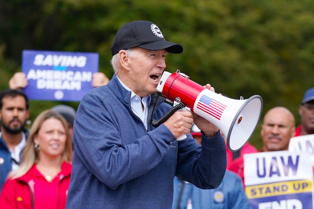President Joe Biden joins striking United Auto Workers on the picket line, Tuesday, Sept. 26, 2023, in Van Buren Township, Mich.