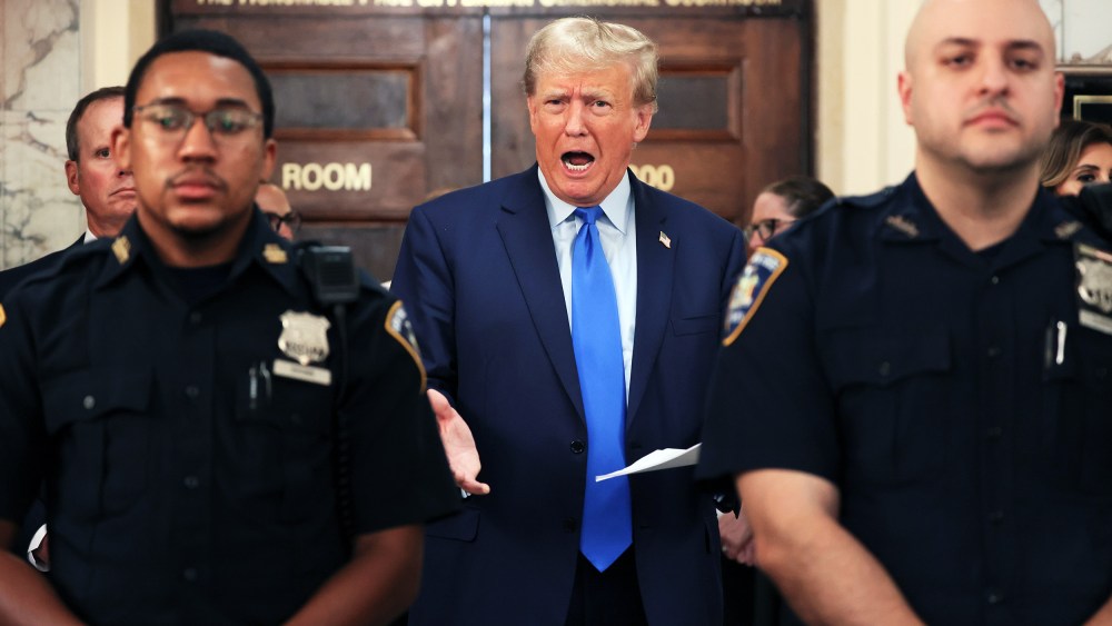 Donald Trump speaks while the court takes a lunch recess during the first day of his civil fraud trial at New York State Supreme Court on Oct. 2, 2023.