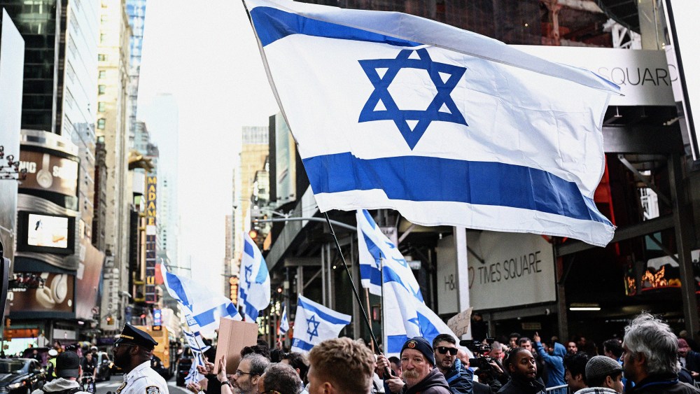 A group of pro-Israel demonstrators gather to protest people attending a Pro-Palestinian demonstration at Times Square in New York, United States on October 13