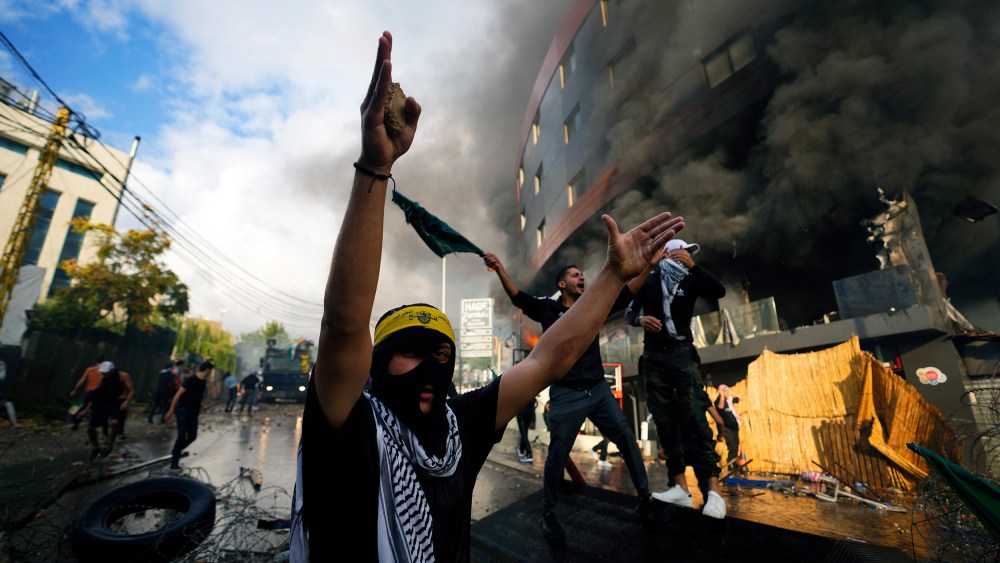 Protesters chant slogans during a demonstration in solidarity with Palestinians in Gaza, near the U.S. embassy in Beirut.