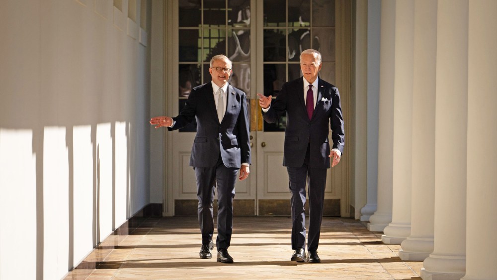Australian Prime Minister Anthony Albanese and President Joe Biden walk down the colonnade to the Oval Office