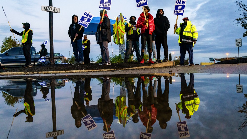 Factory workers and UAW union members on a picket line in Louisville, Kentucky on Oct. 14, 2023 .