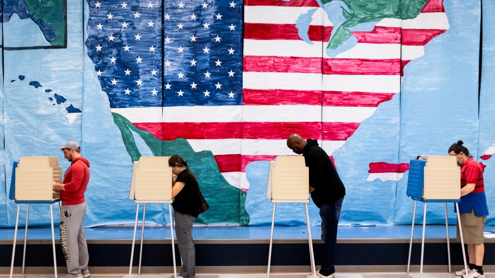 Voters fill out their ballots at a polling station in Midlothian, Va. on Nov. 7, 2023.