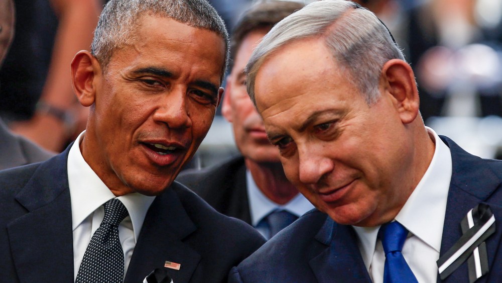 Former U.S. President Barack Obama speaks to Israeli Prime Minister Benjamin Netanyahu in Jerusalem on Sept. 30, 2016.