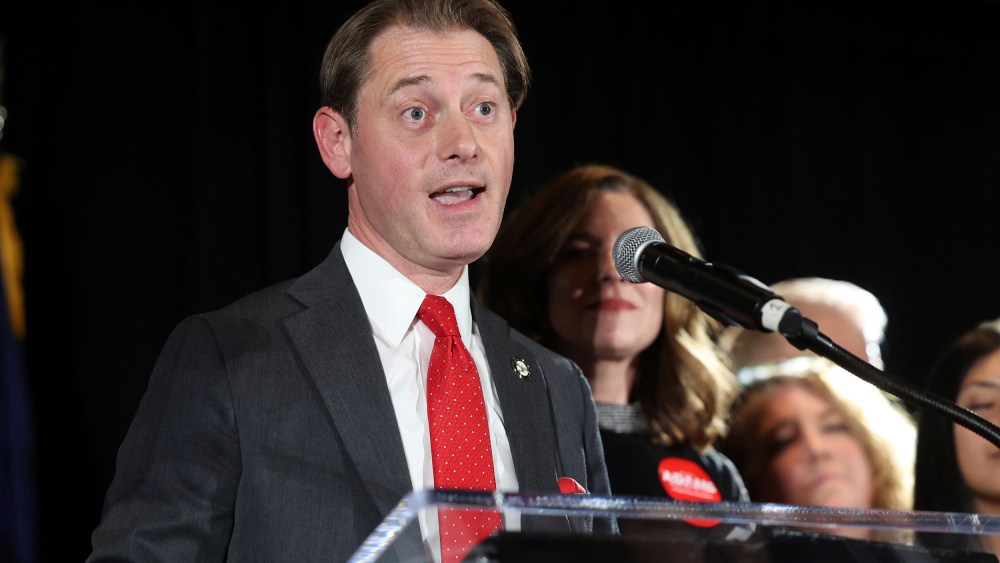 Michael Adams speaks to supporters during an election night watch party in Louisville, Ky.,