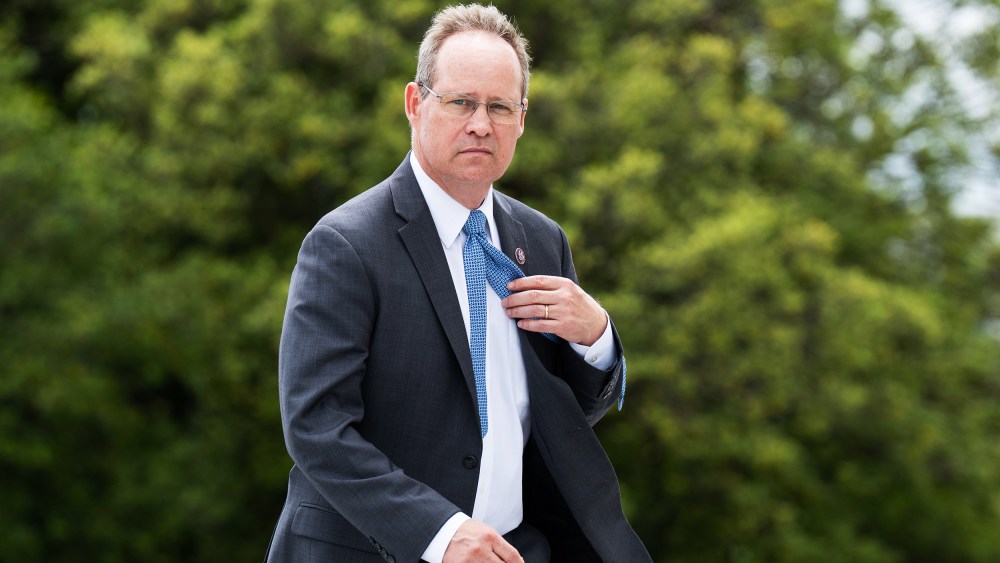 Rep. Greg Murphy, R-N.C., walks up the House steps for a vote in 2022.