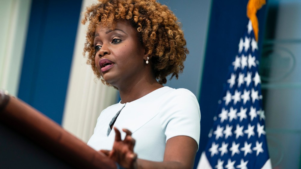 Karine Jean-Pierre speaks at a podium