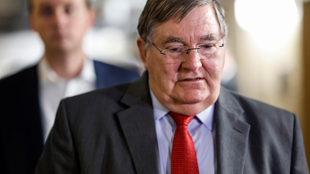 Rep. Michael Burgess, R-Texas, arrives at a Republican caucus meeting at the Capitol on Sept. 13, 2023.