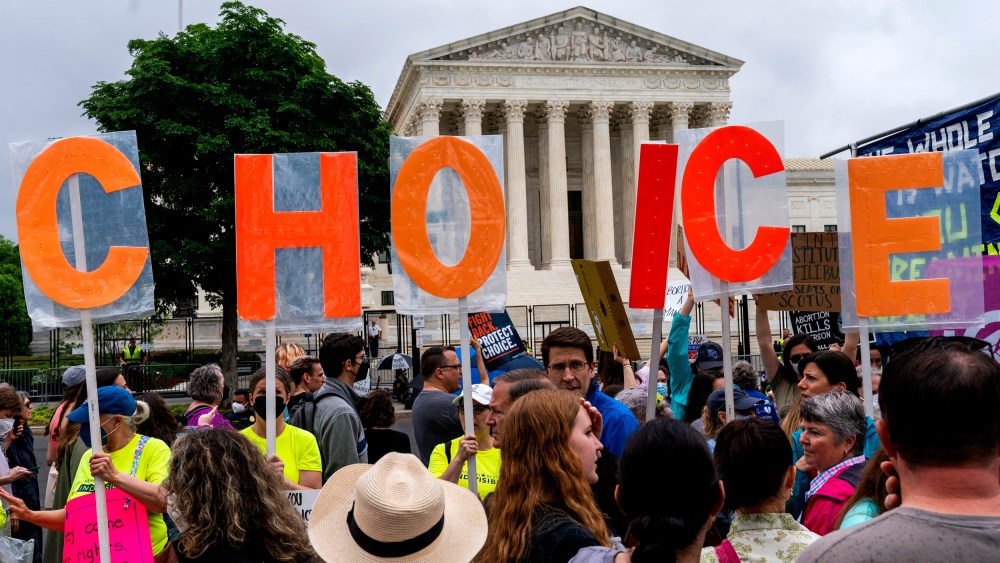 Image: Abortion-rights demonstrators hold up letters spelling out "My Choice."