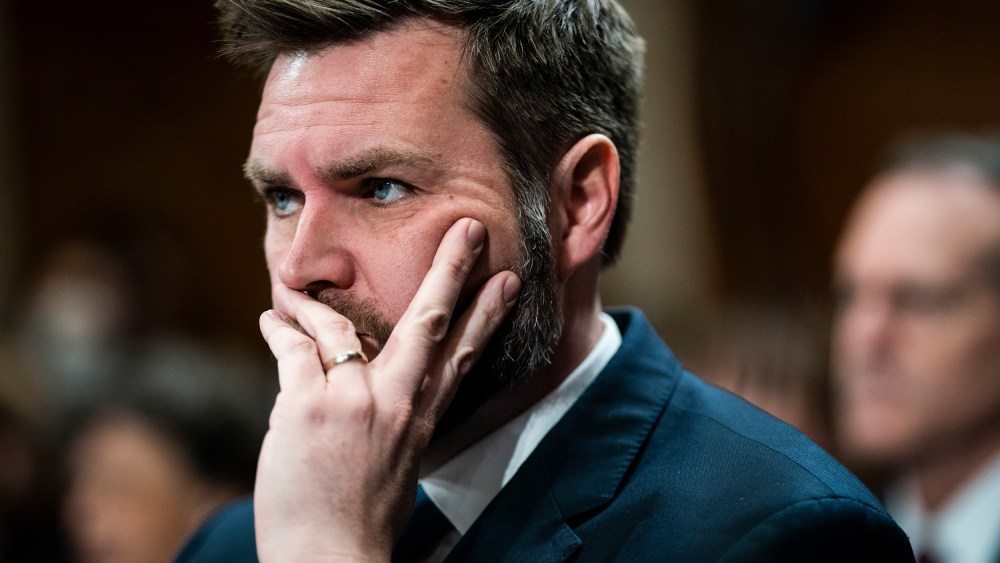 J.D. Vance listens during a hearing.