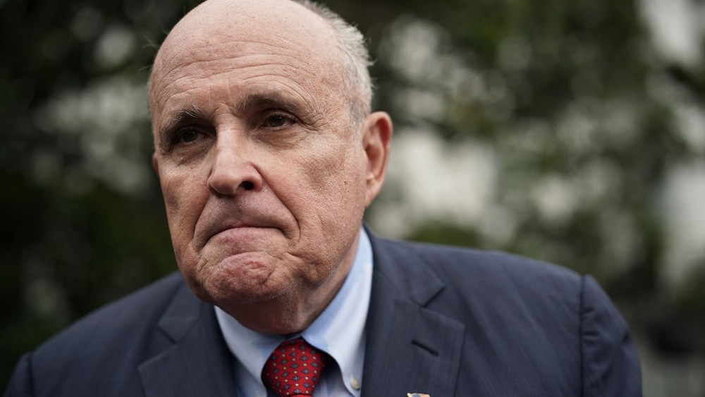 Rudy Giuliani speaks to members of the media during a White House Sports and Fitness Day at the South Lawn of the White House.