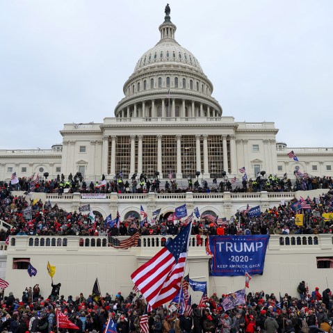 Donald Trump's supporters gather outside the Capitol buildin