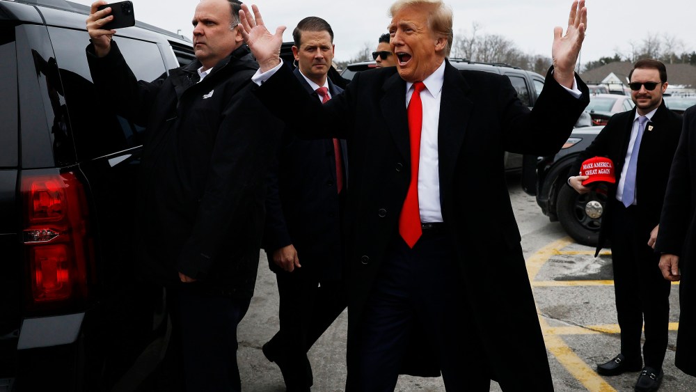 Republican presidential candidate, former President Donald Trump visits a polling site at Londonderry High School on primary day in New Hampshire.