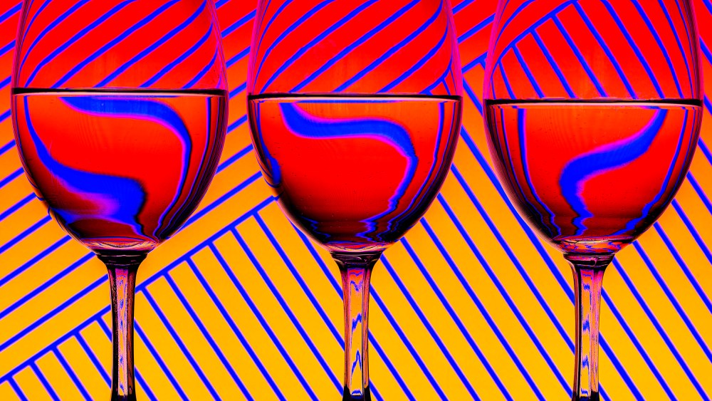 Close-up of wineglasses on table