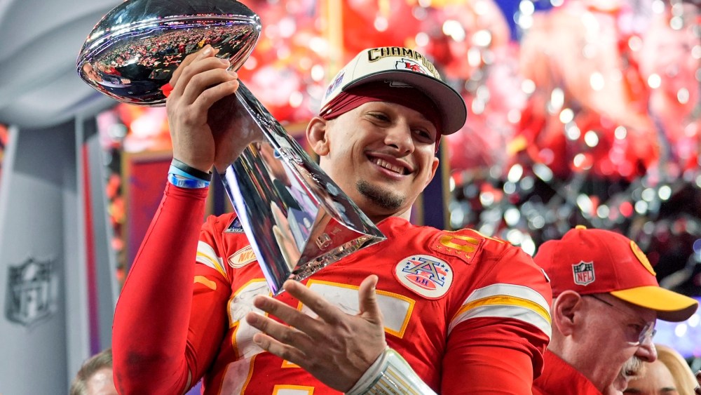 Kansas City Chiefs quarterback Patrick Mahomes celebrates with the trophy after the team's Super Bow win on Feb. 11, 2024, in Las Vegas.