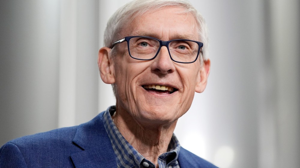 Gov. Tony Evers smiles.