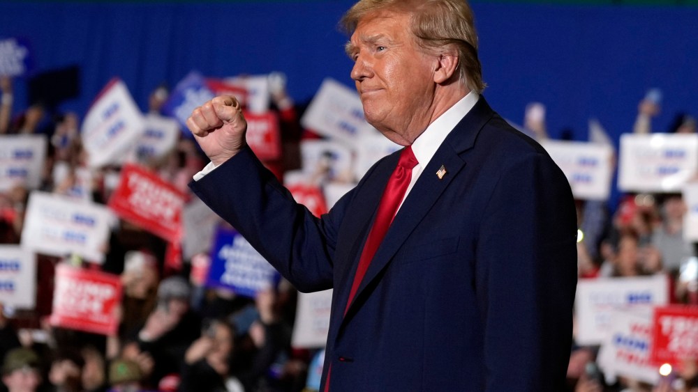Donald Trump arrives at a campaign rally in Greensboro, N.C.