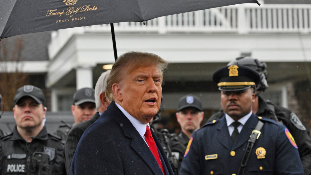 Former President Donald Trump speaks to the press after attending the wake for New York Police Department Officer Jonathan Diller in Massapequa, N.Y., on March 28, 2024.