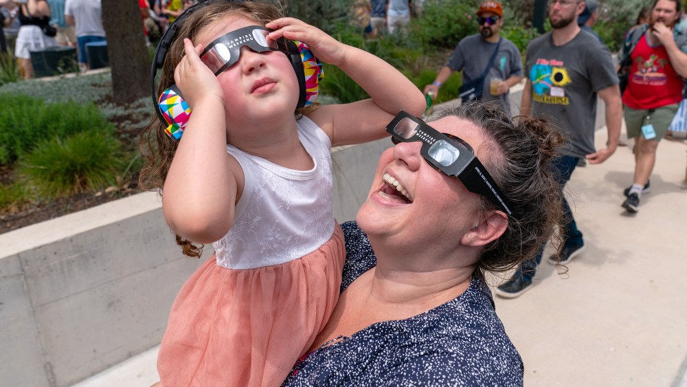 science family mother daughter eclipse glasses
