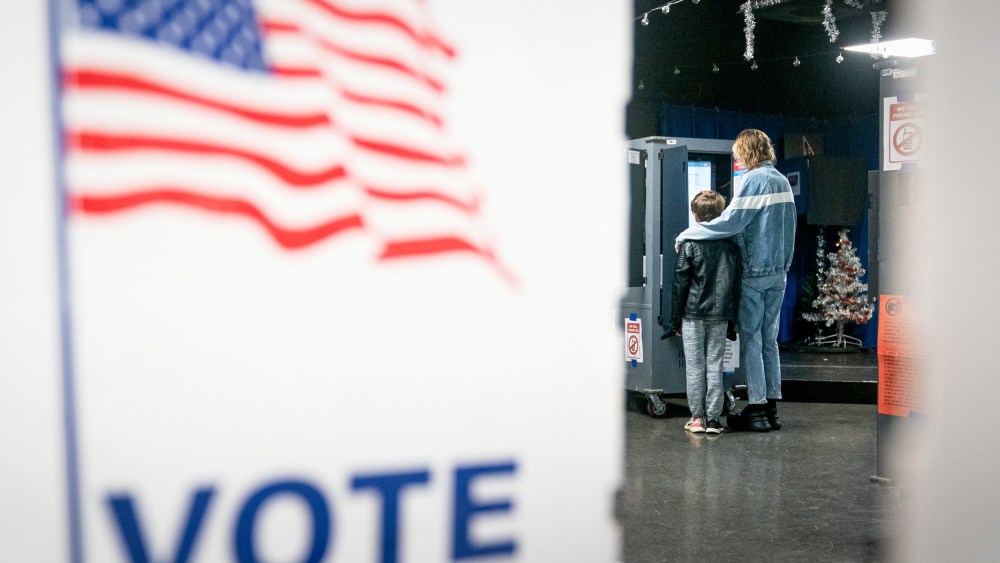 A voter casts a ballot at a polling location.