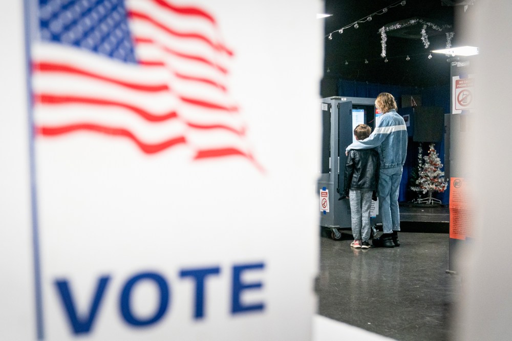 A voter casts a ballot at a polling location.