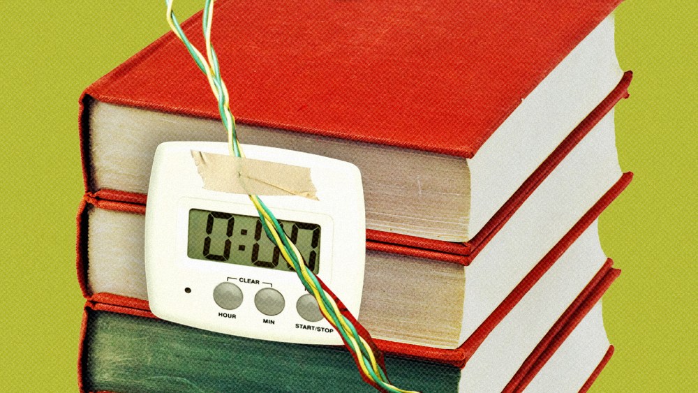 Photo illustration of a time bomb attached to a stack of books