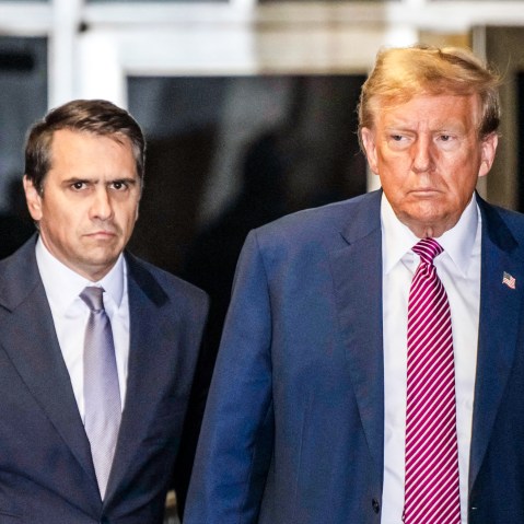 Todd Blanche and Donald Trump speak to the media