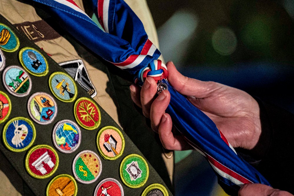 A scout receives a neckerchief.