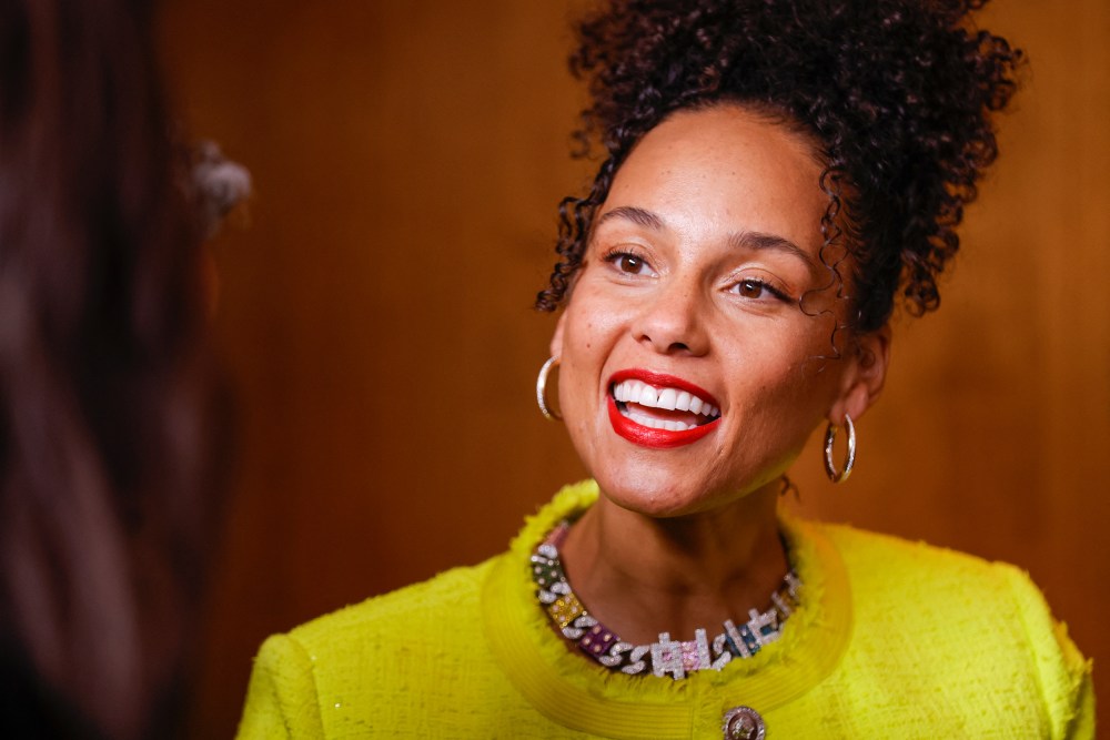 Alicia Keys smiles