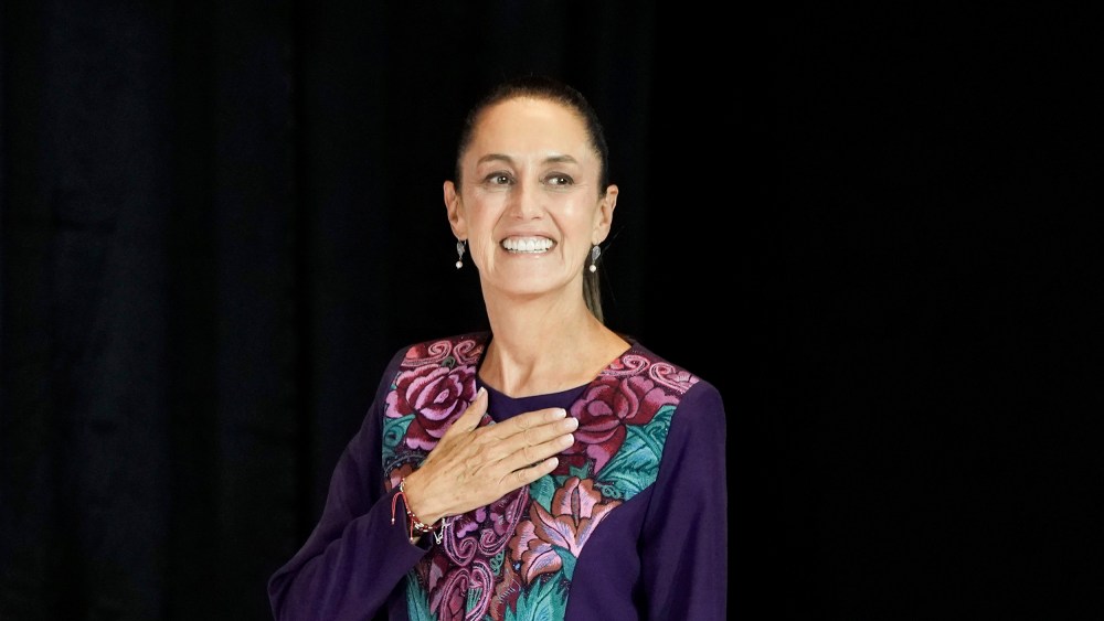 Ruling party presidential candidate Claudia Sheinbaum greets supporters after the polls closed during general elections in Mexico City, on June 3, 2024.