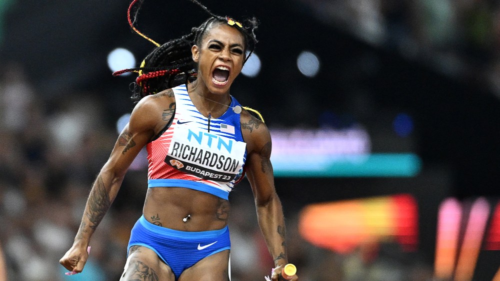 Sha'Carri Richardson after crossing the finish line to win the women's 4x100m relay final during the World Athletics Championships at the National Athletics Centre in Budapest