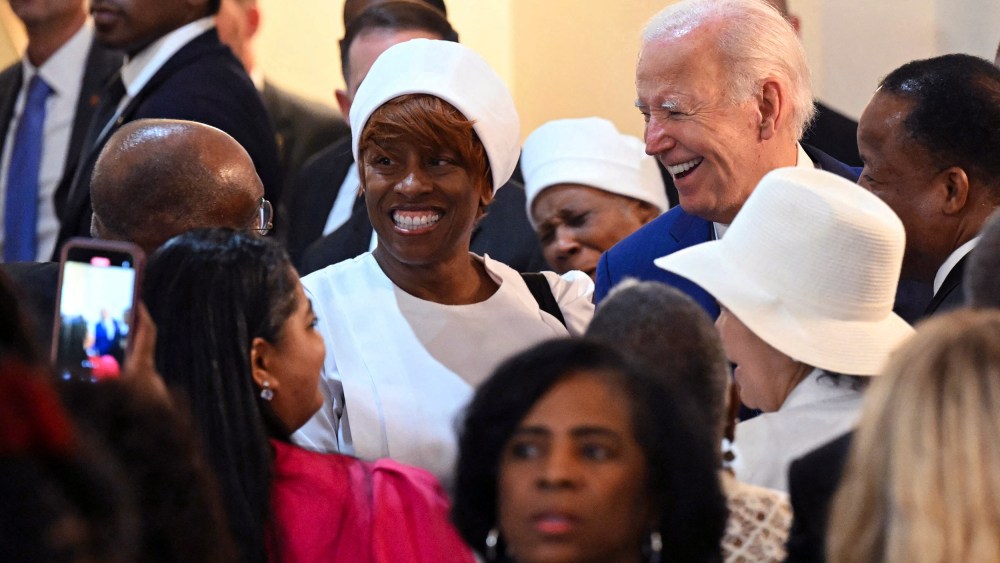 President Joe Biden greets parishioners