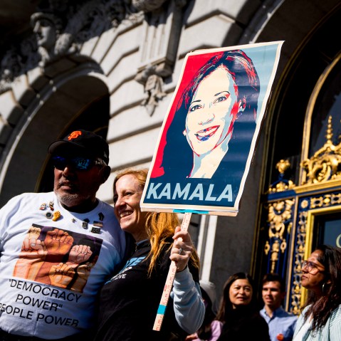Supporters with Kamala Harris sign.