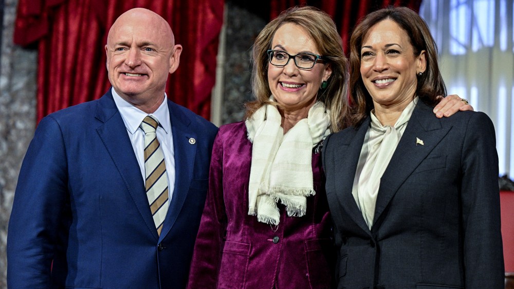 Sen. Mark Kelly, D-Ariz., poses with his wife and former U.S. Rep. Gabby Giffords and Vice President Kamala Harris