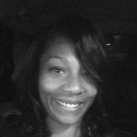 A black and white photo of Sonya Massey
