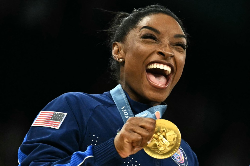 Image: simone biles gold medal gymnastics laugh smile happy