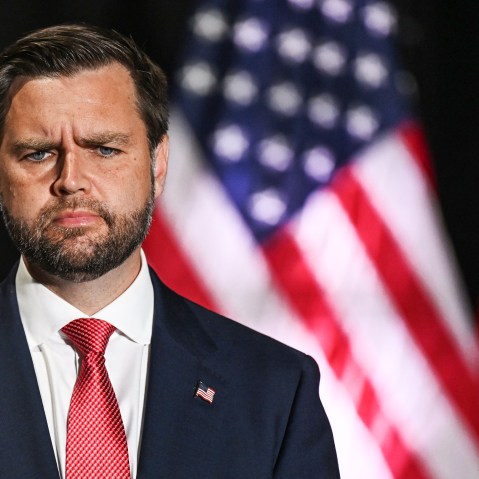 JD Vance frowns on stage