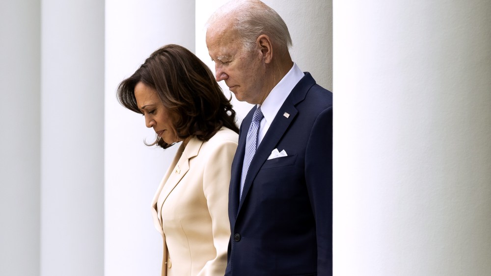 Vice President Kamala Harris and President Joe Biden arrive to the Rose Garden at the White House in 2023.