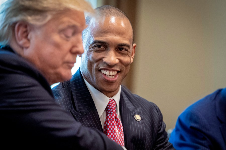 Scott Turner and Donald Trump.