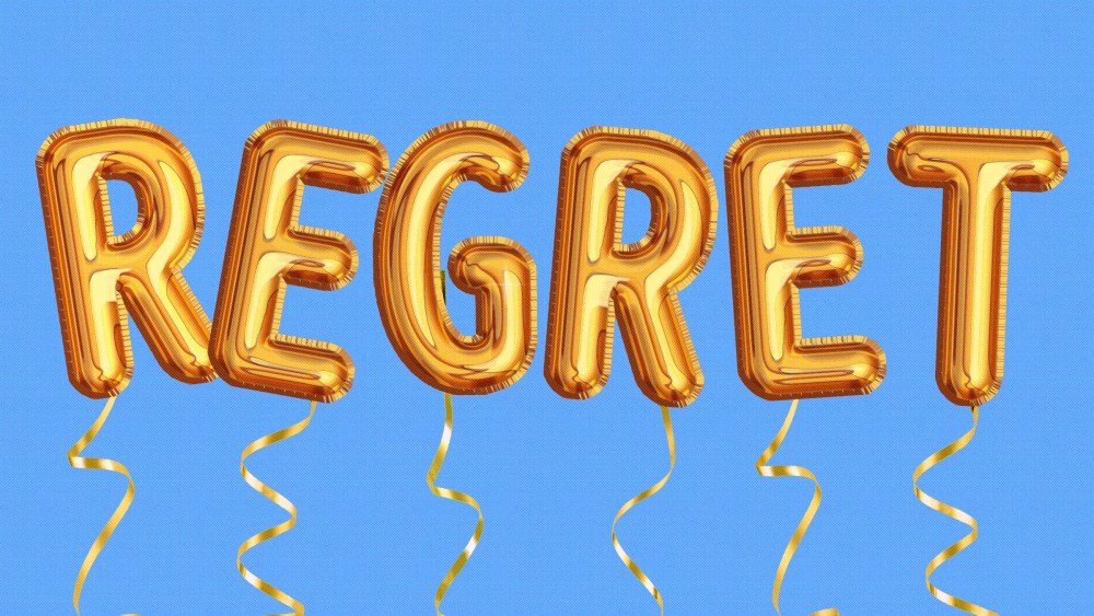 Photo illustration of gold balloons that read "Regret"