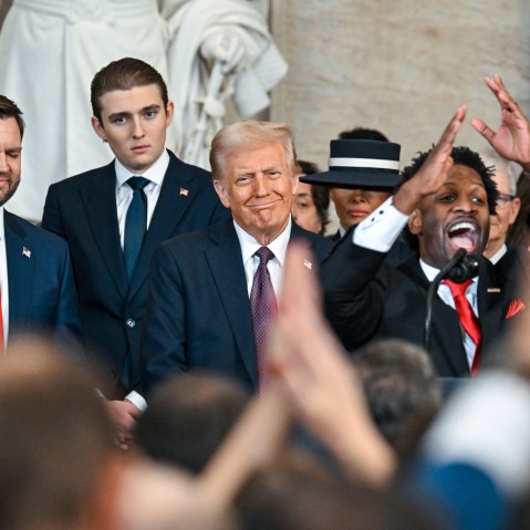 President Donald Trump listens to Senior Pastor Lorenzo Sewell  during his inauguration as the 47th president of the United States.