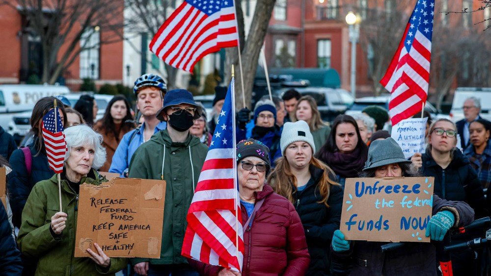 Activists hold rally outside White House.