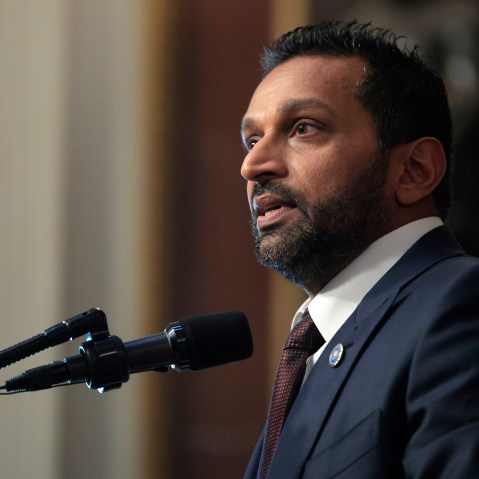 Kash Patel speaks into a microphone