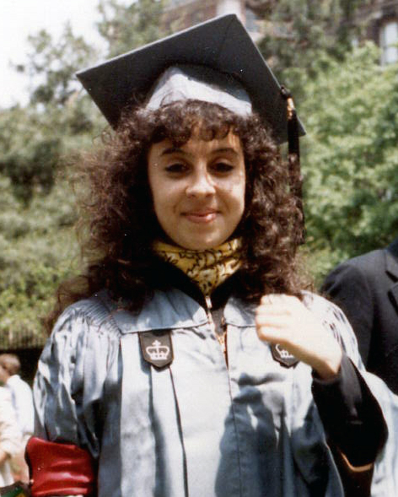 Maria Hinojosa smiles on graduation day