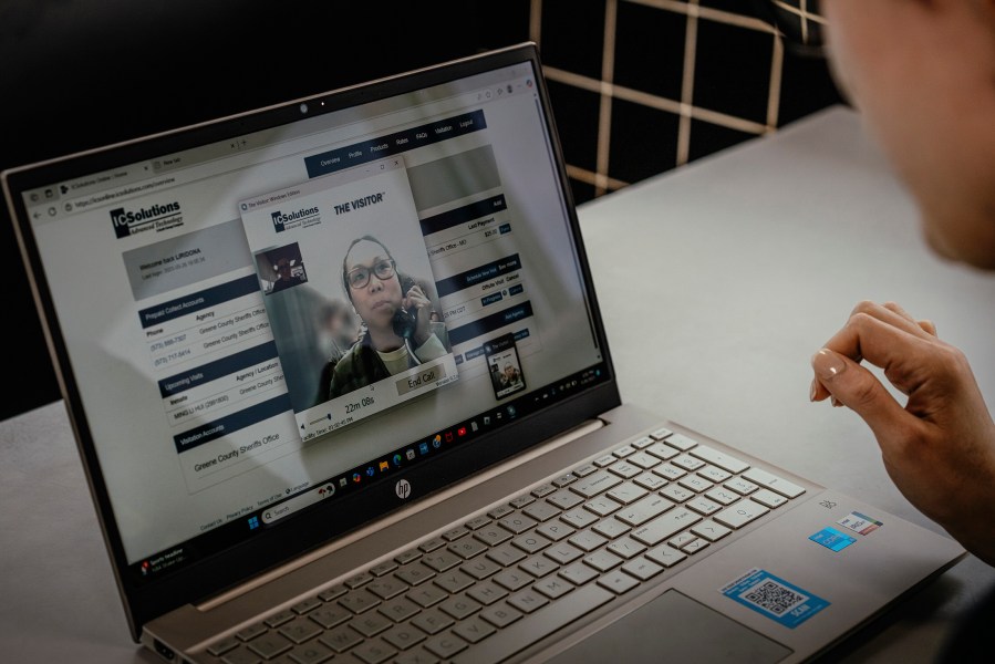 Ming Li Hui, known to people as Carol, speaks from jail by video link to Liradona Ramadani, whose family owns the restaurant where Carol worked, in Kennett, Mo., May 26, 2025. 