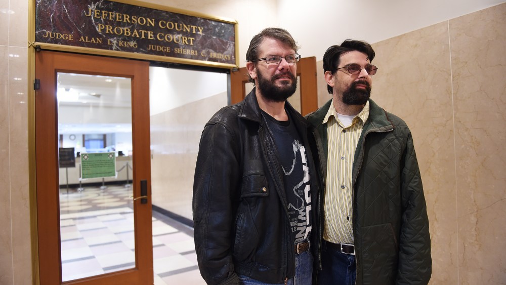 Couple Greg Mullins, left, and Josh Laning, right, both of Birmingham, stand outside the Jefferson County Courthouse Probate office in Birmingham, Ala., on Jan. 26, 2015, after going trying to get a marriage license. (Photo by Tamika Moore/AL.com/Landov)